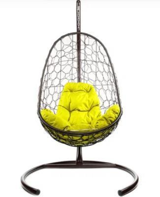 Кресло подвесное ОВАЛ с ротангом коричневое, жёлтая подушка в интернет гипермаркете «Планета Лета». Фото